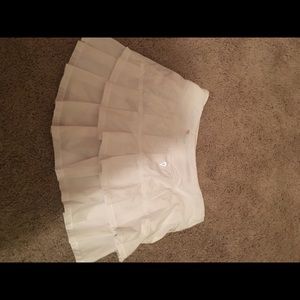 Ivivvia, lululemon: Fast Drift skirt.